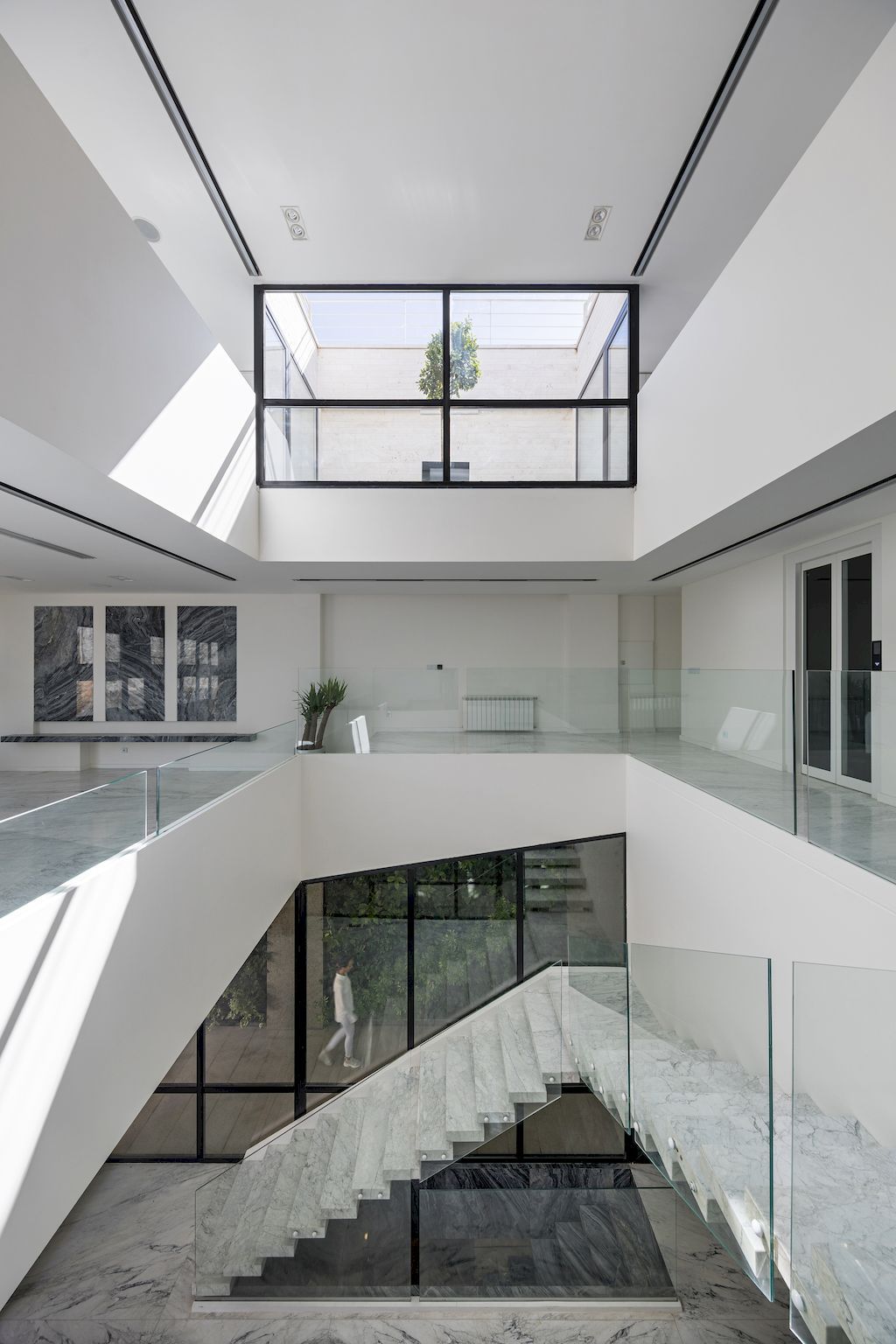 Outside-in House with Harmonious Space Connection by MA Office