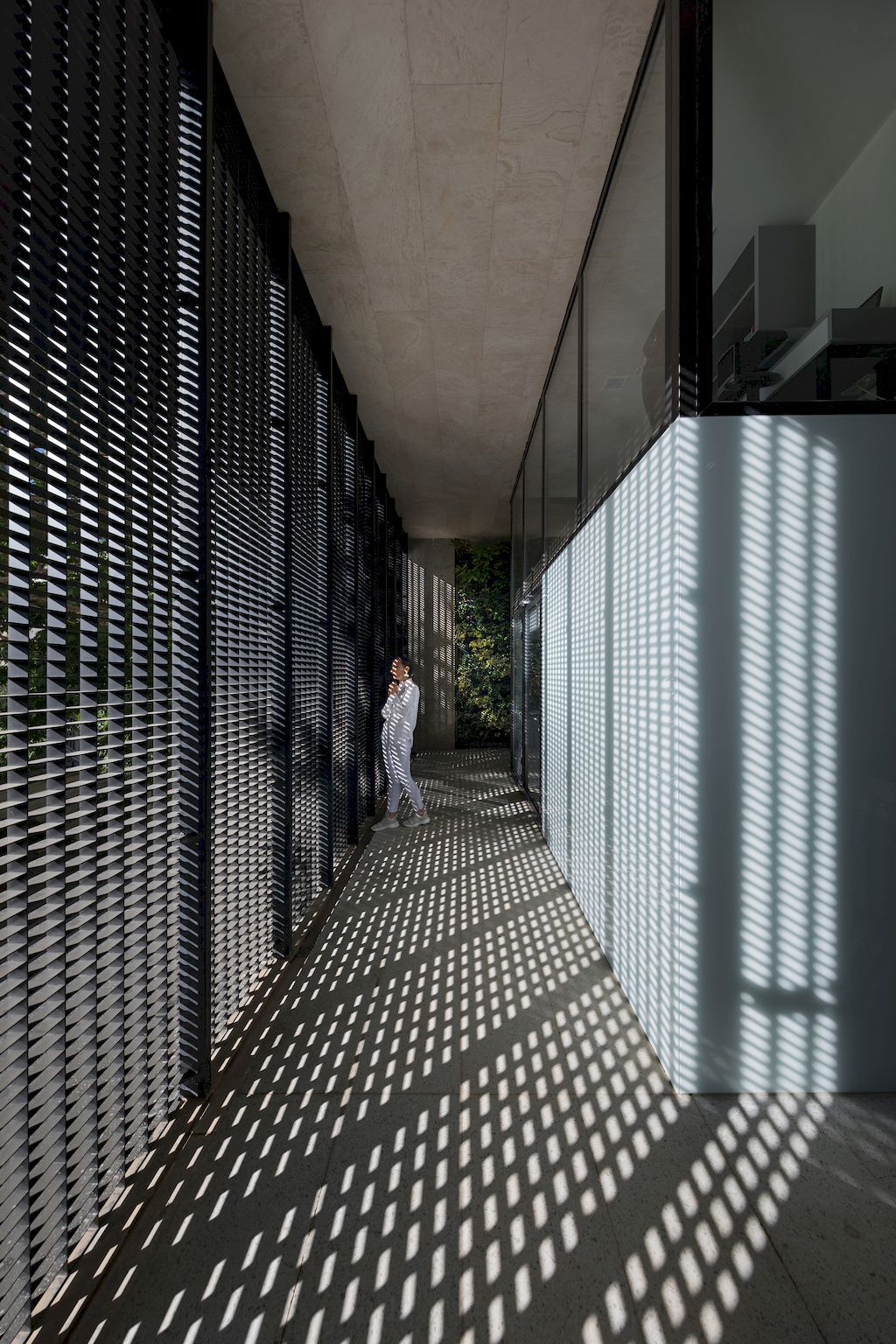 Outside-in House with Harmonious Space Connection by MA Office