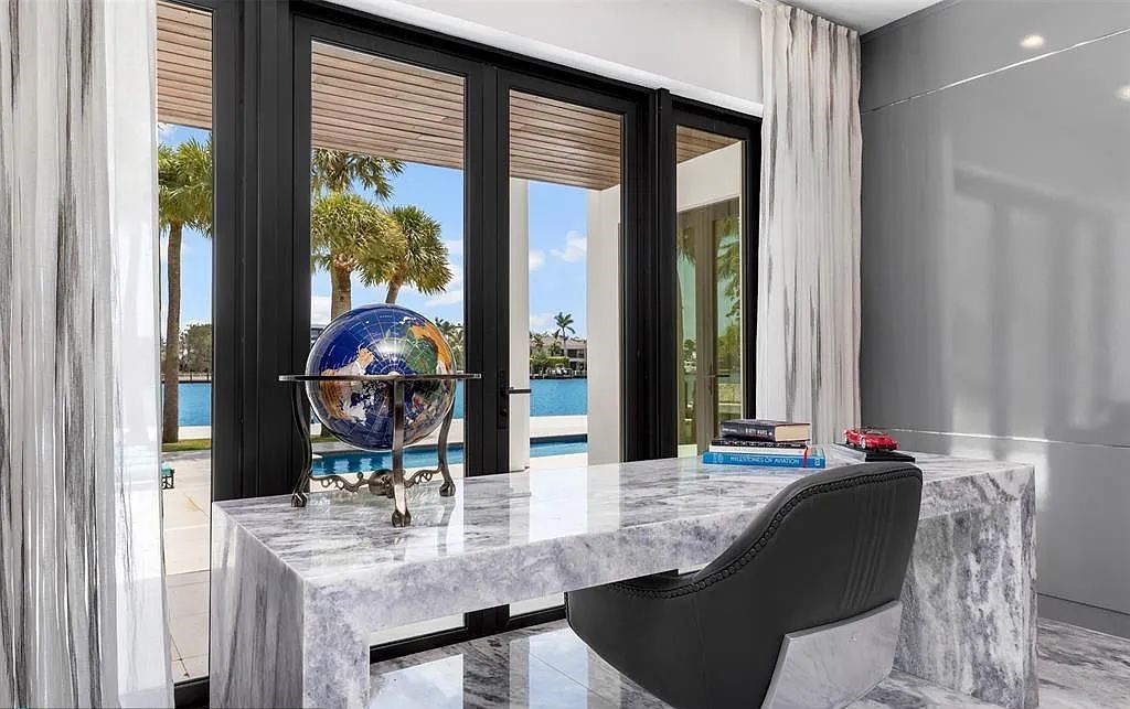 Unmatched in rarity, this classic contemporary Peninsula estate resides on the New River boasting panoramic views on all sides in the exclusive Las Olas Isles. This furnished gem spans +/- 1 acre with an impressive 700' feet of deep-water frontage.
