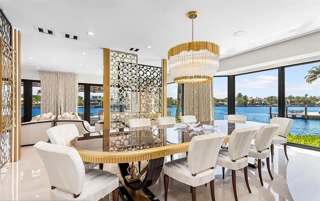 Unmatched in rarity, this classic contemporary Peninsula estate resides on the New River boasting panoramic views on all sides in the exclusive Las Olas Isles. This furnished gem spans +/- 1 acre with an impressive 700' feet of deep-water frontage.