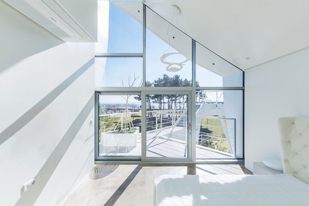 Sailing House Offers Sweeping Vistas of the Sea by IROJE KHM Architects