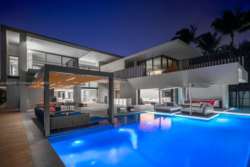 Nestled on the exclusive Star Island in Miami Beach, this 2019-built estate at 27 Star Island Drive is the epitome of luxury living. With 9 bedrooms and 12 bathrooms, the meticulously crafted interiors span nearly 23,000 square feet, showcasing a breathtaking 21-foot-high ceiling salon, a chef's dream kitchen, and multiple entertainment spaces, including two media rooms.