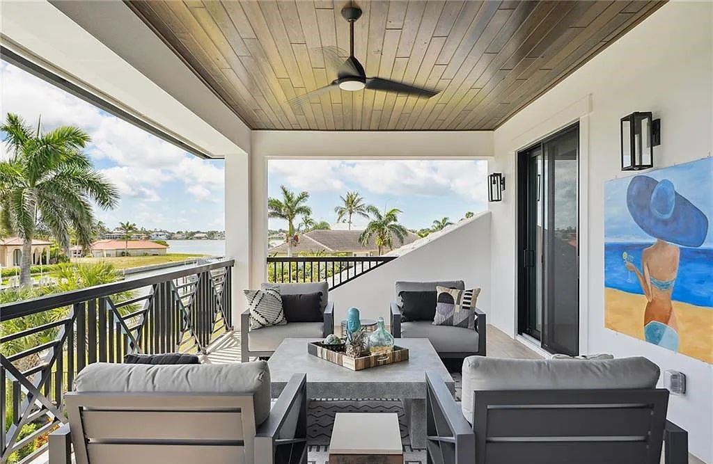 Experience the epitome of waterfront luxury at 541 Hammock Ct, Marco Island, Florida. Built in 2020 in the prestigious Coastal Contemporary Estates area, this home boasts grandeur with a 30-foot foyer ceiling and breathtaking water views.