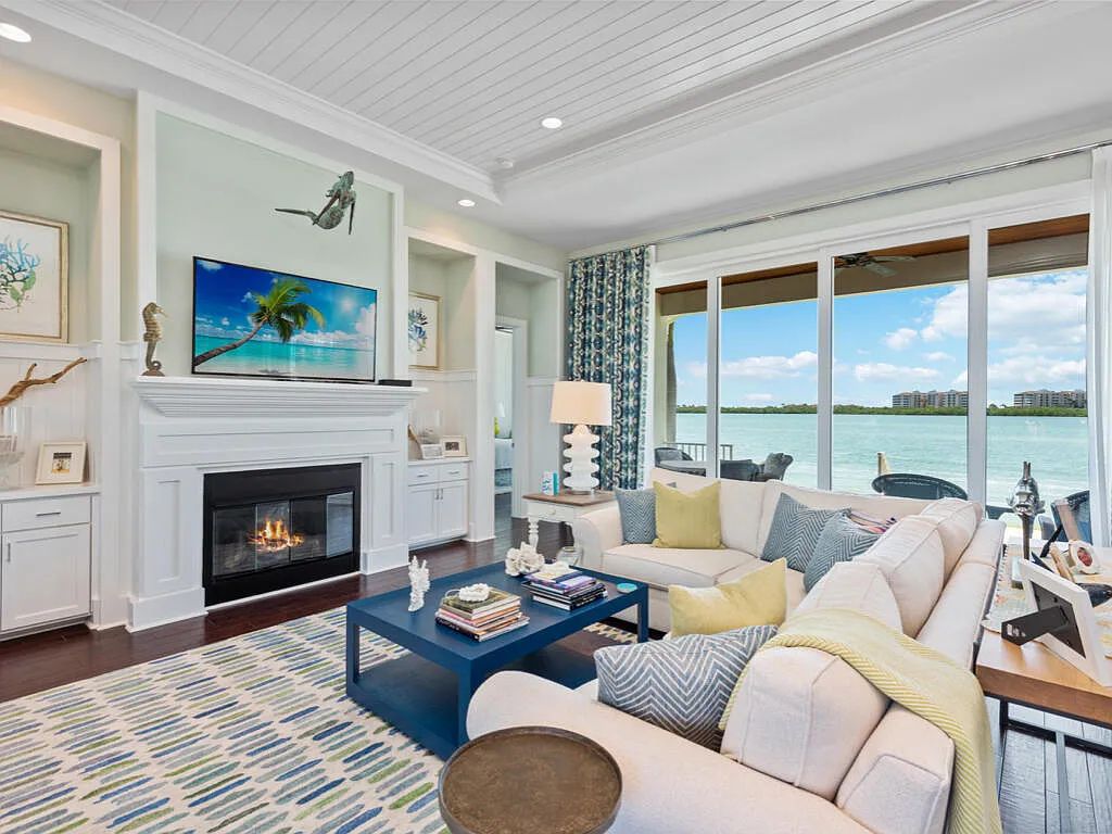 Nestled in prestigious Collier Bay on Marco Island, 960 Giralda Ct embodies coastal luxury living at its finest. With unobstructed bay views, this 2014-built, 4-bedroom, 5-bathroom home seamlessly combines opulence and coastal chic style.