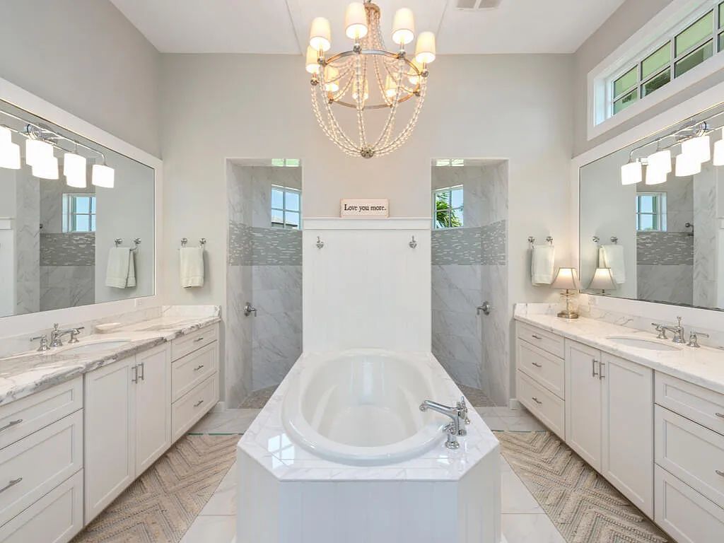 Nestled in prestigious Collier Bay on Marco Island, 960 Giralda Ct embodies coastal luxury living at its finest. With unobstructed bay views, this 2014-built, 4-bedroom, 5-bathroom home seamlessly combines opulence and coastal chic style.