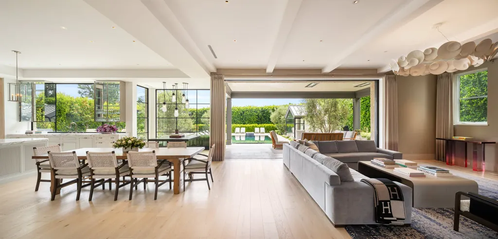 12740 Hanover Street Home in Los Angeles, California. Explore a luxurious and impressive estate in Los Angeles, offering unrivaled panoramic views from downtown to the Pacific Ocean. Floor-to-ceiling automatic glass doors seamlessly blend indoor and outdoor spaces.