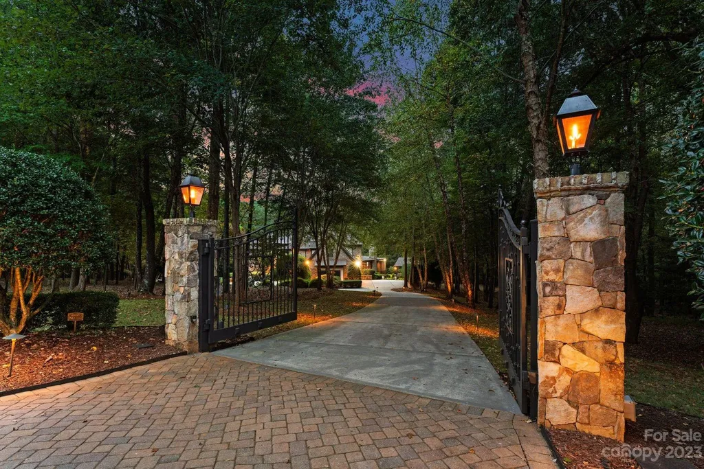13305 Claysparrow Road Home in Charlotte, North Carolina. Welcome to the epitome of luxury living within the exclusive gates of 13305 Claysparrow Road in The Sanctuary @ Lake Wylie! This immaculately maintained private estate has undergone recent enhancements, including a new roof, AC units, hot water heater, and renovated guest bathrooms.