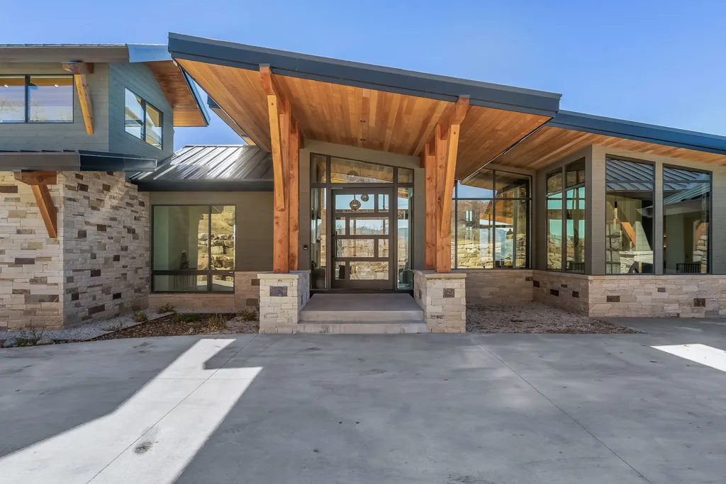 2409 Preserve Drive Home in Park City, Utah. Discover this stunning 6-bedroom, 8-bathroom, 9,196 sq. ft. contemporary home in The Preserve, a premier gated community. Perched on 9.07 acres at the mountain's summit, the home offers breathtaking 280-degree views of ski areas, the Olympic Park, and Salt Lake City.