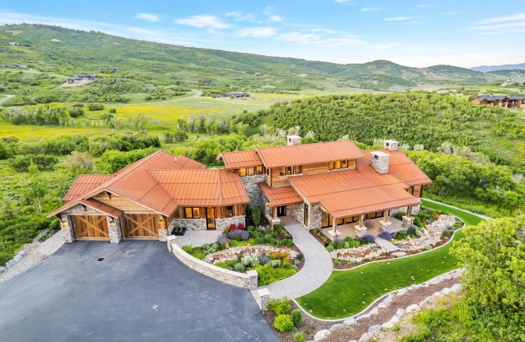 977 West Deer Hill Home in Park City, Utah. Discover opulent mountain living in this 4-bedroom, 6,103 sq ft modern home in Park City's exclusive Preserve community. With stunning views, spacious living areas, and exceptional features like radiant heat, a backup generator, and proximity to outdoor trails, this retreat offers unparalleled luxury and tranquility.