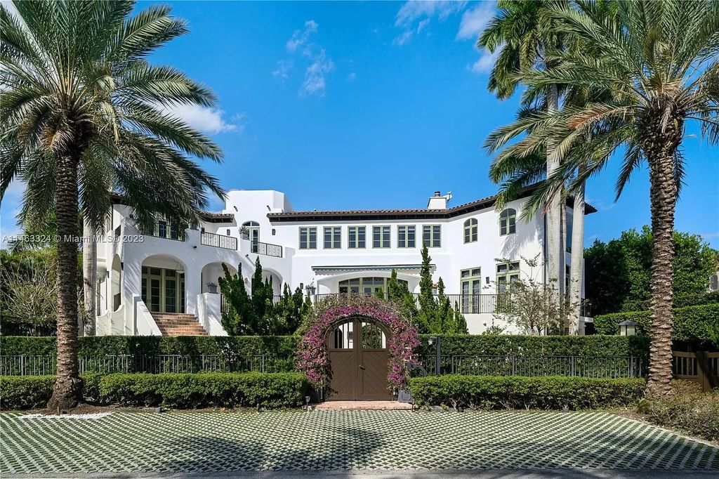 Nestled in Miami's exclusive Coconut Grove enclave within the private guard-gated community of “The Moorings,” this expansive 7-bedroom, 9-bathroom waterfront estate at 3305 S Moorings Way offers 14,720 square feet of meticulously crafted living space.