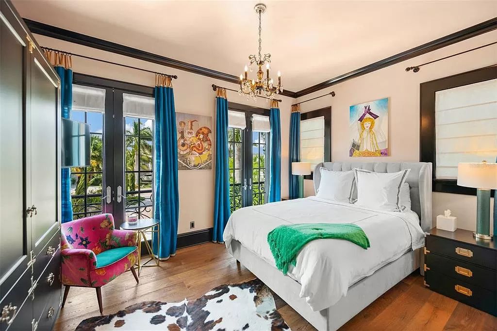 Discover the epitome of luxury living on Anna Maria Island with this meticulously crafted Villa Rosa Way residence. Inspired by the elegance of Europe's 18th Century Romantic Era, this 4-bed, 6-bath property offers an opulent experience at every turn.