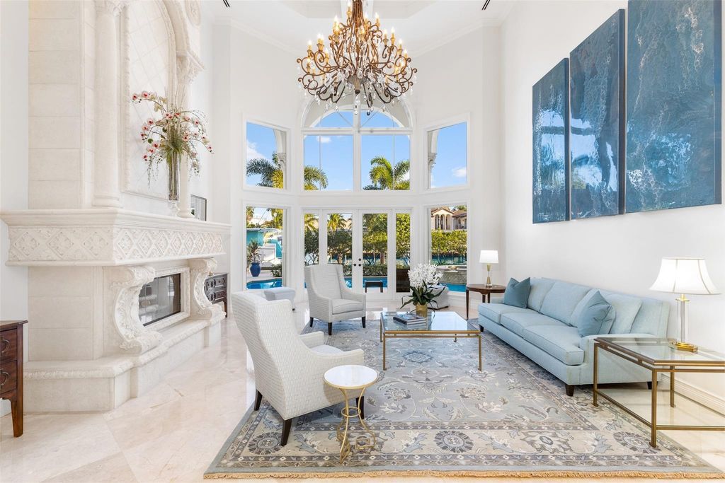 Discover the epitome of waterfront luxury living at 2521 Mercedes Dr, Fort Lauderdale, FL. Nestled in the prestigious Harbor Beach gated community, this 7-bed, 8-bath estate boasts 7,484 square feet of exquisite design.