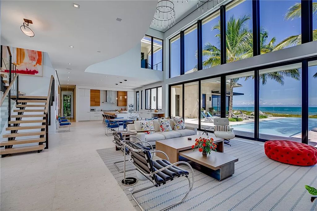 This modern oceanfront estate, located at 6600 N Highway A1a, Hutchinson Island, Florida, spans 1.5 acres and offers unparalleled privacy. With 149 glass windows and doors, it seamlessly blends stone, wood, and glass, creating a masterpiece of luxury and tranquility.