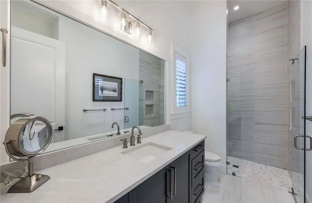 Discover the epitome of luxury living at 685 Cameo Ct in Marco Island, Florida. This stunning 3-bedroom, 4-bathroom home with 3,009 square feet of living space was custom-built in 2022 by Aqua Custom Homes.