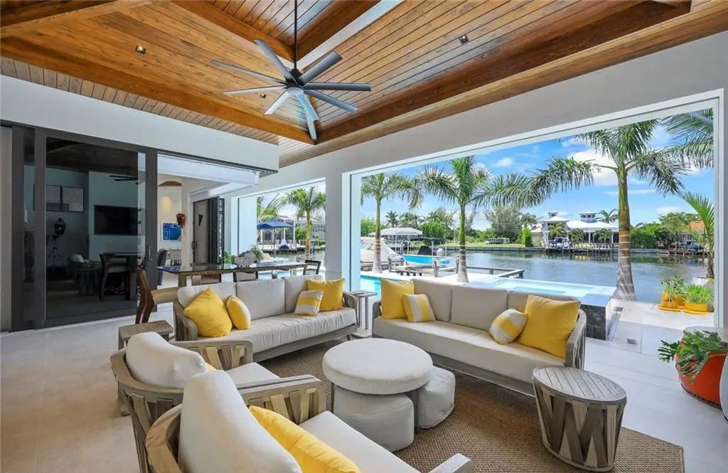 Discover the epitome of luxury living at 685 Cameo Ct in Marco Island, Florida. This stunning 3-bedroom, 4-bathroom home with 3,009 square feet of living space was custom-built in 2022 by Aqua Custom Homes.