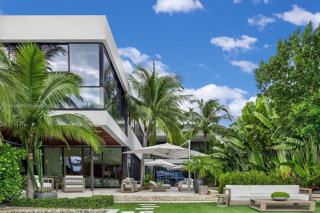 Discover the pinnacle of Miami Beach luxury living at 1142 N Venetian Dr, FL 33139. This 6-bedroom, 6-bath residence spans 6,685 sqft, boasting a seamless blend of contemporary design and comfort. Nestled on the soon-to-be exclusive gated section of the Venetian Islands, this home offers a louvered dining area, media lounge, suede-paneled living salon, and an expansive teak kitchen with Miele & SubZero appliances.