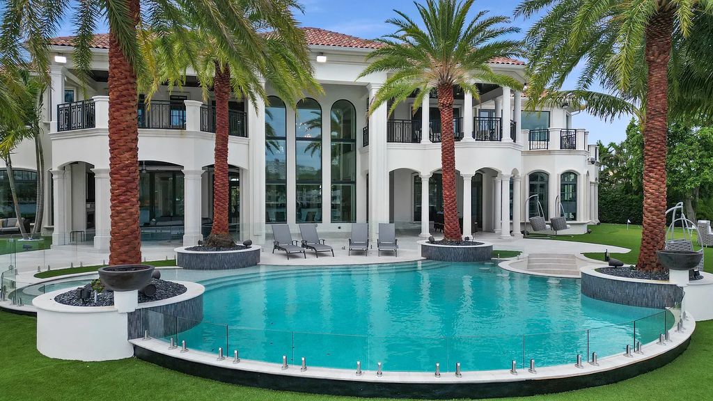 Welcome to 3080 NE 41st St, Fort Lauderdale, FL, a luxurious 6-bedroom, 9-bathroom estate built in 2019. This exceptional property boasts 190 feet of side dockage and 140 feet on the Intracoastal Waterway, making it a boater's paradise and an entertainer's dream with an outdoor speaker system.