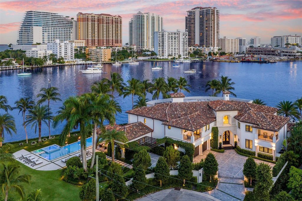 Discover the epitome of luxury waterfront living in this exceptional 6-bedroom, 8-bathroom estate at 2724 Sea Island Dr, Fort Lauderdale. Located in the prestigious Seven Isles neighborhood, this half-acre double lot showcases two pools, covered outdoor spaces, and 325 feet of southeast-exposure waterfront.