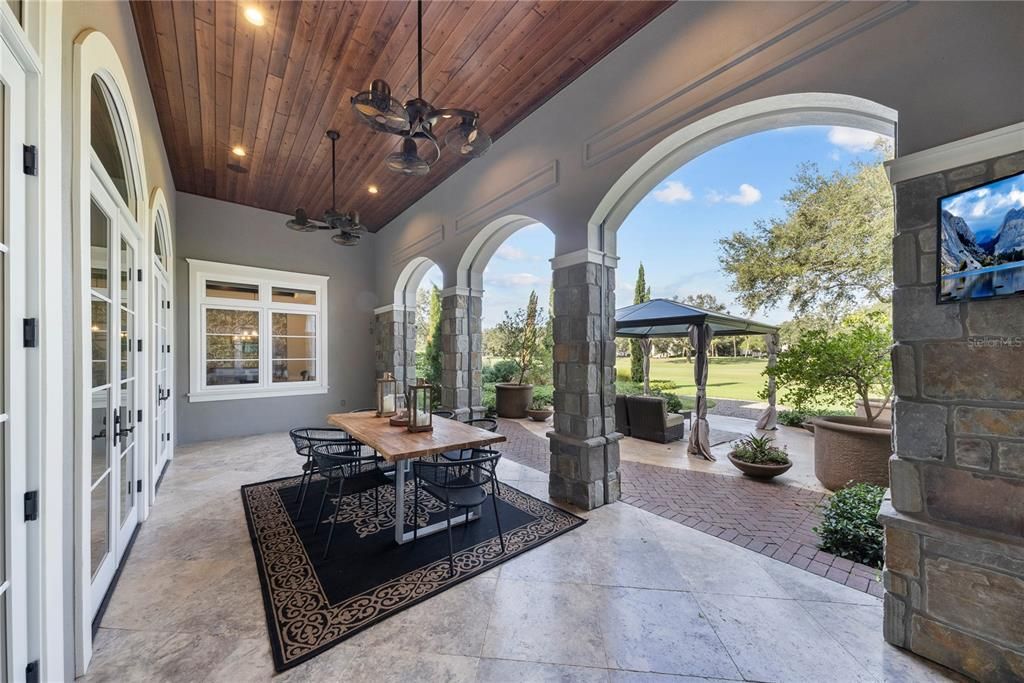 This extraordinary 2018 custom estate, nestled along Tampa's Palma Ceia Golf Course, combines masterful craftsmanship, cutting-edge technology, and lush landscapes. With 6 bedrooms, 8 bathrooms, and 7,872 square feet of living space on a 0.55-acre lot, this home offers grandeur without sacrificing comfort.