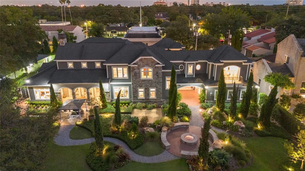 This extraordinary 2018 custom estate, nestled along Tampa's Palma Ceia Golf Course, combines masterful craftsmanship, cutting-edge technology, and lush landscapes. With 6 bedrooms, 8 bathrooms, and 7,872 square feet of living space on a 0.55-acre lot, this home offers grandeur without sacrificing comfort.