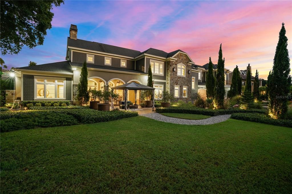 This extraordinary 2018 custom estate, nestled along Tampa's Palma Ceia Golf Course, combines masterful craftsmanship, cutting-edge technology, and lush landscapes. With 6 bedrooms, 8 bathrooms, and 7,872 square feet of living space on a 0.55-acre lot, this home offers grandeur without sacrificing comfort.