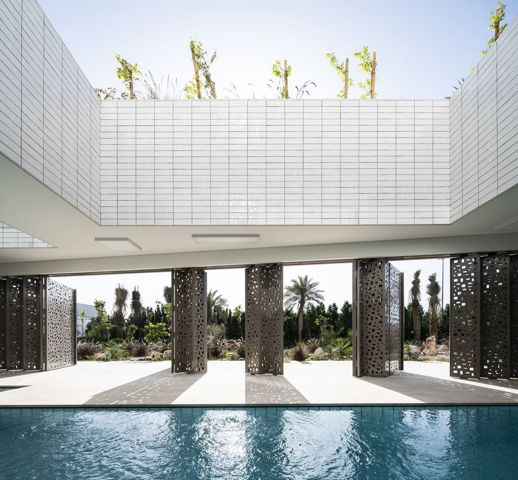 Pixel House, A Modern Oasis Blends Nature and Privacy by AGi Architects