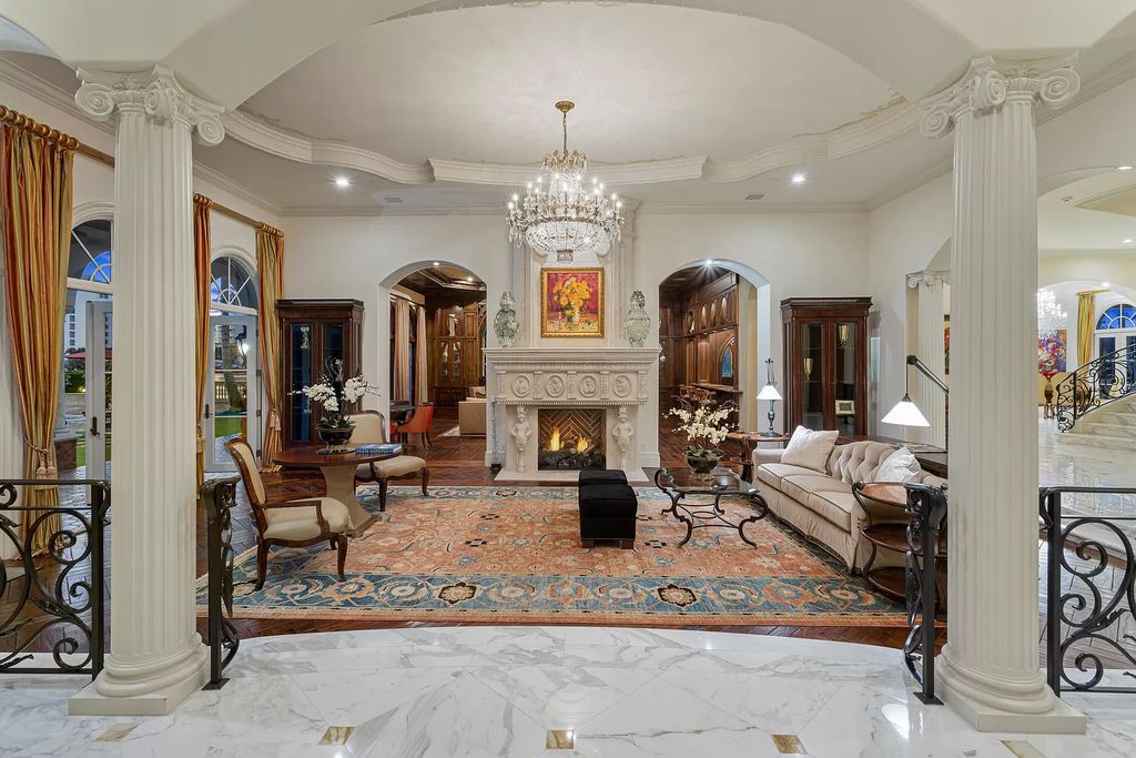 Nestled on a prime 1.06-acre waterfront estate at 5001 Egret Point Circle, Boca Raton, this Italianate marvel in The Sanctuary presents 8 bedrooms, 14 baths, and 14,848 square feet of opulent living space, meticulously crafted in 2005.