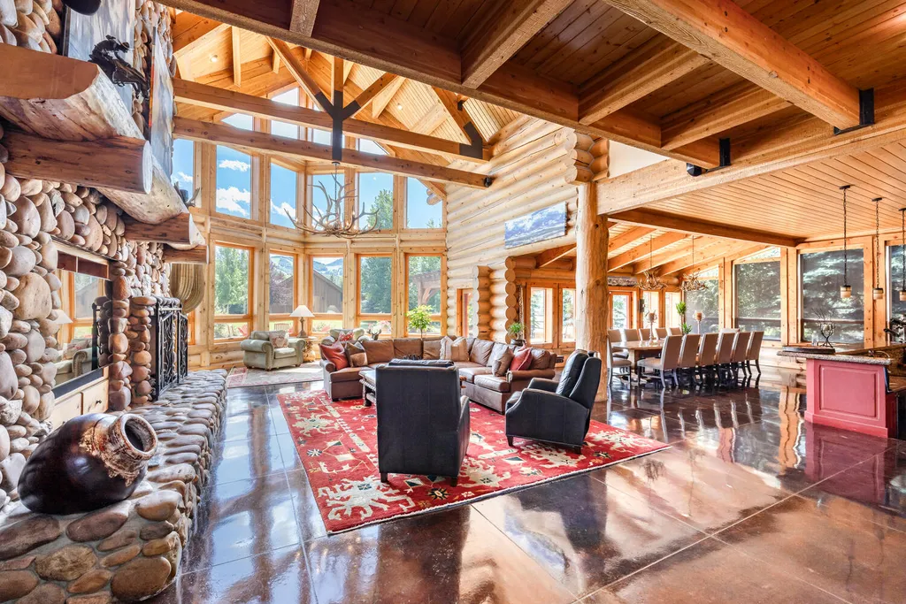 1391 Little Kate Road Home in Park City, Utah. Discover the perfect blend of rustic charm and modern comfort in this Park Meadows gem. With 6 bedrooms, radiant living areas, 2 home offices, and a TruGolf simulator barn, this home is a mountain paradise.
