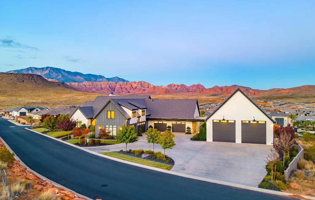 1822 North Habitat Drive Home in Saint George, Utah. Step into the lap of luxury with this extraordinary modern estate boasting panoramic views, impeccable craftsmanship, and unparalleled amenities. From the gourmet kitchen and multiple offices to the dedicated theater room and 2644 sqft indoor basketball gym, this home defines opulence. 