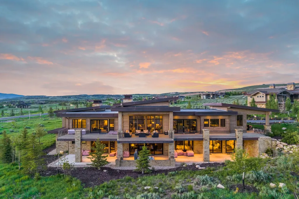 2481 Prairie Schooner Trail LOT 16 Home in Park City, Utah. Discover this exquisite Scandinavian custom-built "green home" in Promontory, offering easy access, stunning views, and a golf membership. With a thoughtfully designed interior and turnkey furnishings, this multi-generational family estate provides an ideal setting for an active lifestyle.