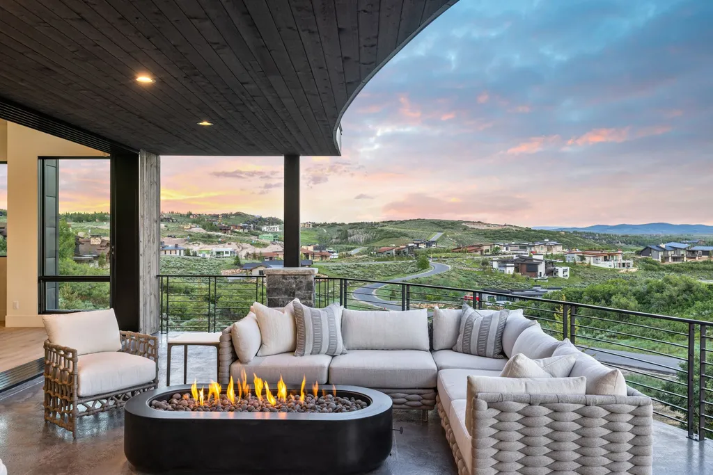 2687 East Canyon Gate Road Home in Park City, Utah. Immerse yourself in the pinnacle of luxury living with this James L. Carroll-designed estate in Promontory Ridge, Park City. Boasting over 8,600 sq ft of opulent space, panoramic mountain views, and exquisite finishes, this property is a true architectural masterpiece.