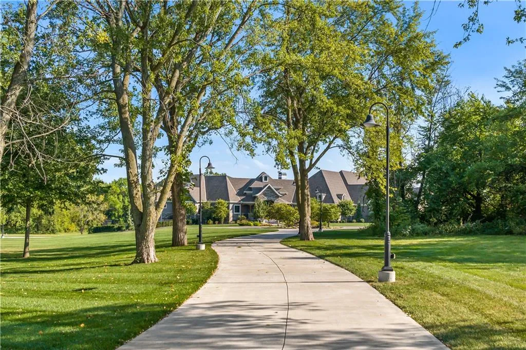 9925 West 159th Street Home in Overland Park, Kansas. Discover this modern masterpiece on 22+ private acres within the coveted Blue Valley School District. The STARR estate home, boasting nearly 14,000 sq ft of luxurious living space, features exceptional craftsmanship and high-quality materials. With 6 bedrooms, 9 bathrooms, a 6-car garage, and numerous unique amenities, this home is designed for the ultimate entertainer's dream.