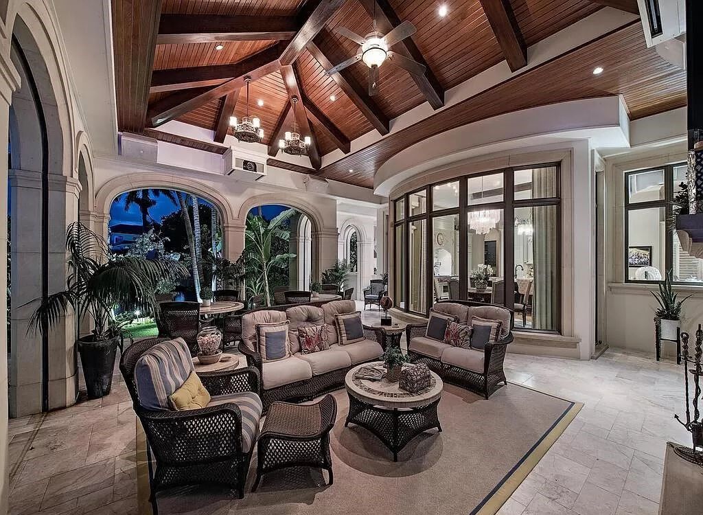 Discover an unparalleled living experience at 960 17th Ave S, Naples, Florida, where luxury meets breathtaking natural beauty. This extraordinary estate spans approximately 1.12 acres, offering 340 feet of waterfrontage with unobstructed bay views.