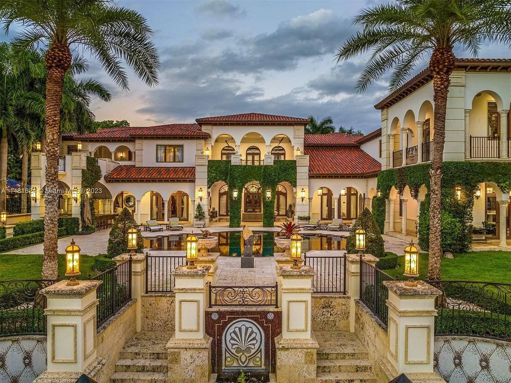 Indulge in the pinnacle of waterfront luxury at 150 Edgewater Drive, Coral Gables. This Mediterranean-style estate, nestled on prestigious Edgewater Drive, boasts 180 feet of deep-water frontage, an 80-foot inlet slip, and direct bay access - a paradise for boating enthusiasts.
