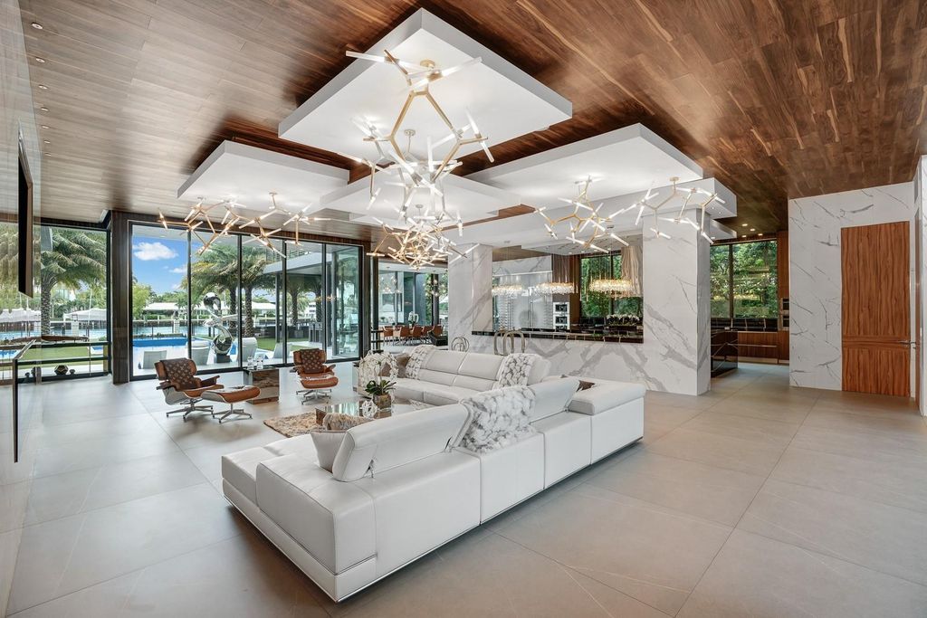 Welcome to 671 Middle River Dr, Fort Lauderdale – a 2020 Prestige-built masterpiece in a gated waterfront community. This 9,138sqft smart home boasts 5 beds, 9 baths, and designer finishes throughout.