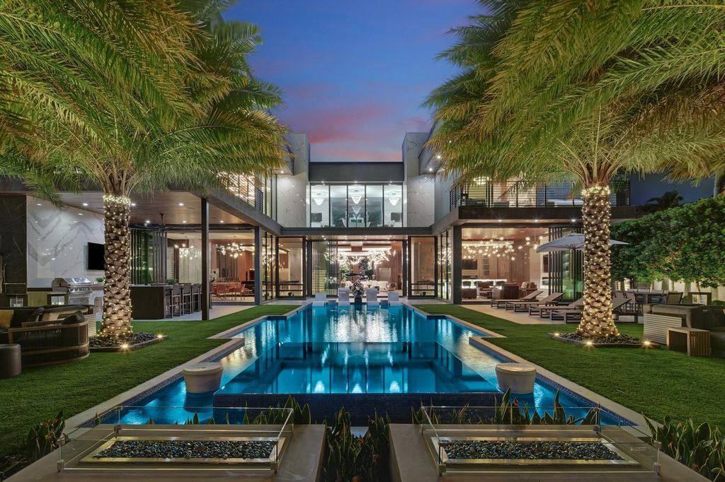Welcome to 671 Middle River Dr, Fort Lauderdale – a 2020 Prestige-built masterpiece in a gated waterfront community. This 9,138sqft smart home boasts 5 beds, 9 baths, and designer finishes throughout.