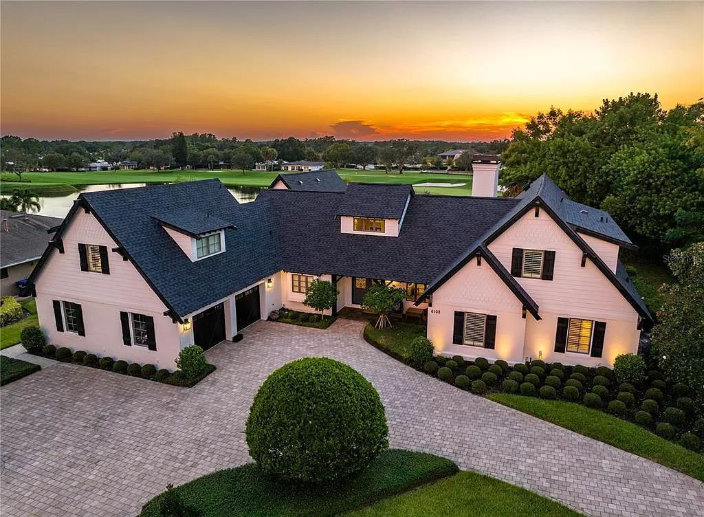 Nestled on Arnold Palmer's Bay Hill Club and Lodge's 18th green, this 5-bed, 6-bath estate epitomizes luxury living. Renovated to perfection, its grandeur unfolds in the vaulted great room with panoramic golf course views.
