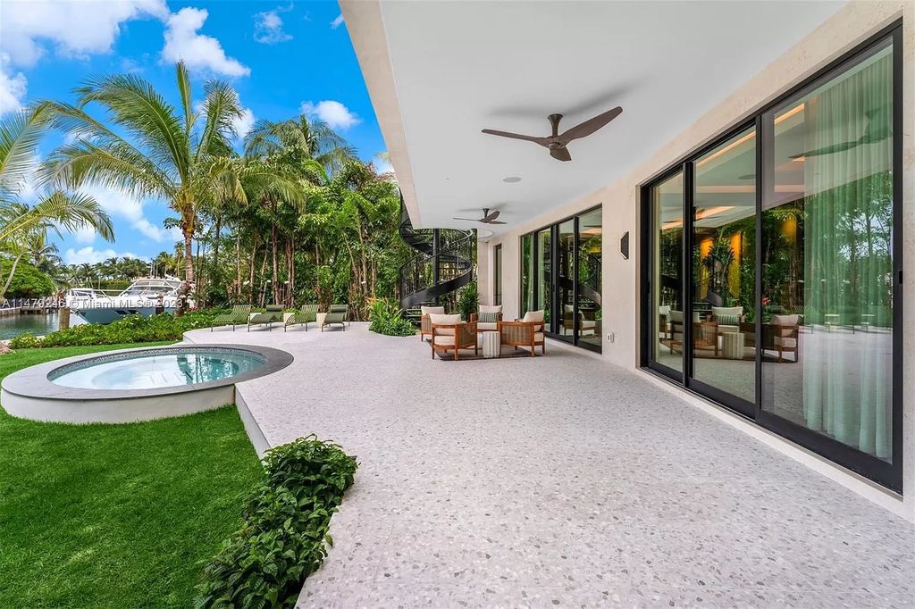 Indulge in the epitome of luxurious waterfront living at this newly built 4-bed, 5-bath haven on 2000 N Bay Rd, Miami Beach. With 80 feet of water frontage and a 60-foot dock, this property offers seamless access to Miami's pristine waters.