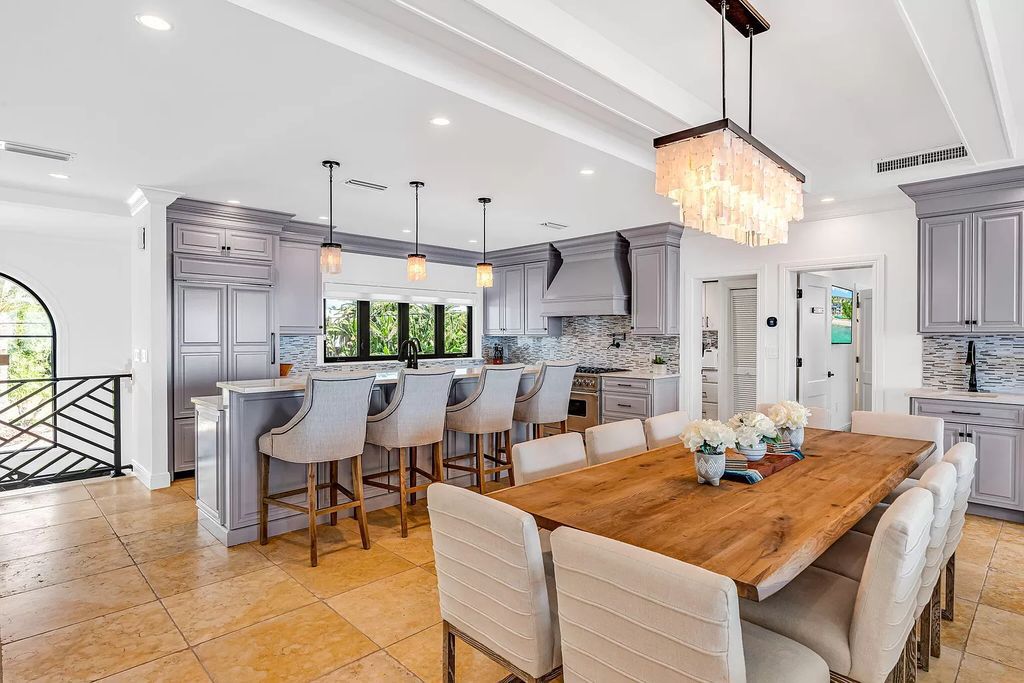Experience the epitome of luxurious coastal living at the iconic Lighthouse on Key Colony Beach's prestigious 15th Circle. This recently updated home offers a seamless blend of comfort and elegance, boasting breathtaking ocean views from its generously sized living spaces.
