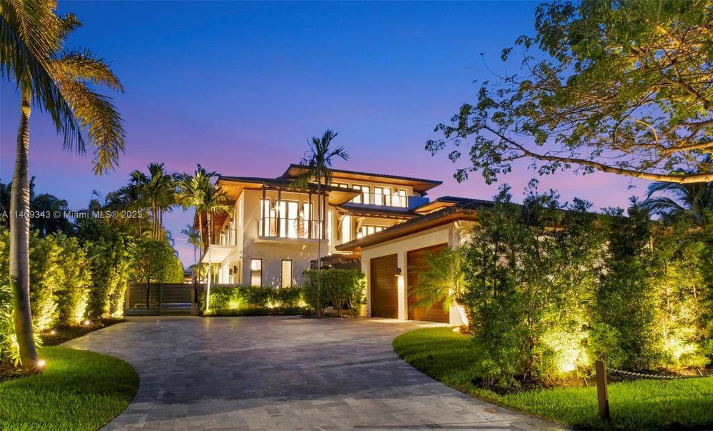 Indulge in the epitome of luxury at this exquisite waterfront Key Biscayne home on 1020 Mariner Dr. Crafted by renowned architect Cesar Molina, this sanctuary boasts natural stone and wood accents throughout, updated kitchens and bathrooms, a soaring two-story living room, 5 bedrooms plus a bonus 6th on the third floor, and 6.5 bathrooms offering panoramic views.