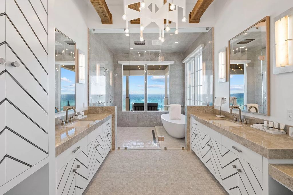 Discover the epitome of Gulf-front luxury living at 3504 E Co Highway 30A, a stunning new construction in Seagrove Beach along scenic County Highway 30A. Crafted by esteemed architects Archiscapes & Cronk Duch, this magnificent residence boasts 9 full bedroom suites, 10 baths, and over 8,200 square feet of meticulously designed living space across three levels.
