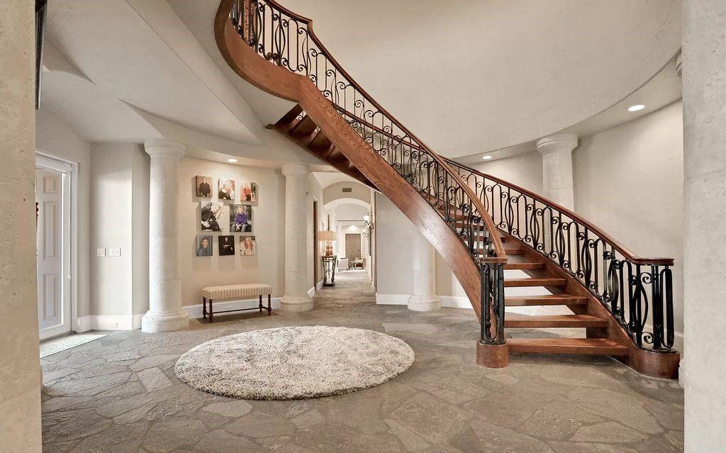 Step into the epitome of coastal luxury at 1263 Ponte Vedra Blvd, an awe-inspiring custom estate in Ponte Vedra Beach. Perched on a high bluff with 200' of ocean-frontage, this 12,751-square-foot sanctuary boasts 6 ensuite bedrooms, 7 full and 3 half baths, a media room, elevator, and a wine cellar for 2200 bottles.