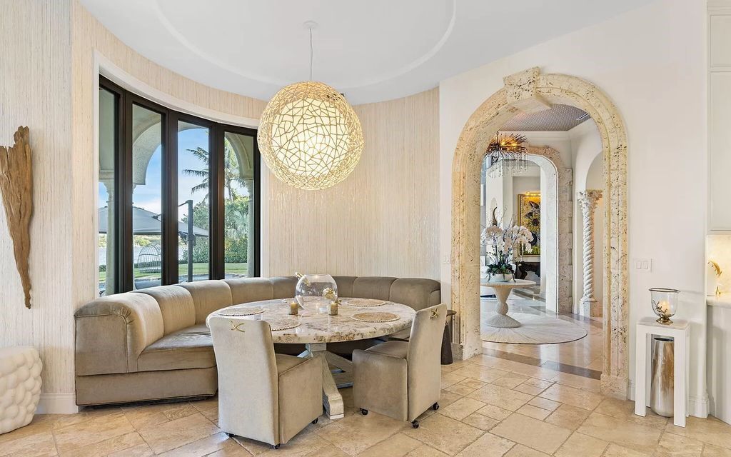 Nestled in prestigious Manalapan, Florida, 1520 Paslay Pl unveils a 10,645-square-foot waterfront haven, meticulously renovated to exude modern opulence. With 6 beds, 8 full baths, and 2 half baths, this residence epitomizes luxury living.