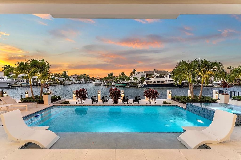 Step into the epitome of waterfront luxury living at this newly constructed 2022 masterpiece in Lighthouse Point, South Florida. Boasting 5 bedrooms, 7 bathrooms, and spanning over 7,200 sqft, this estate offers a seamless blend of opulence and functionality.
