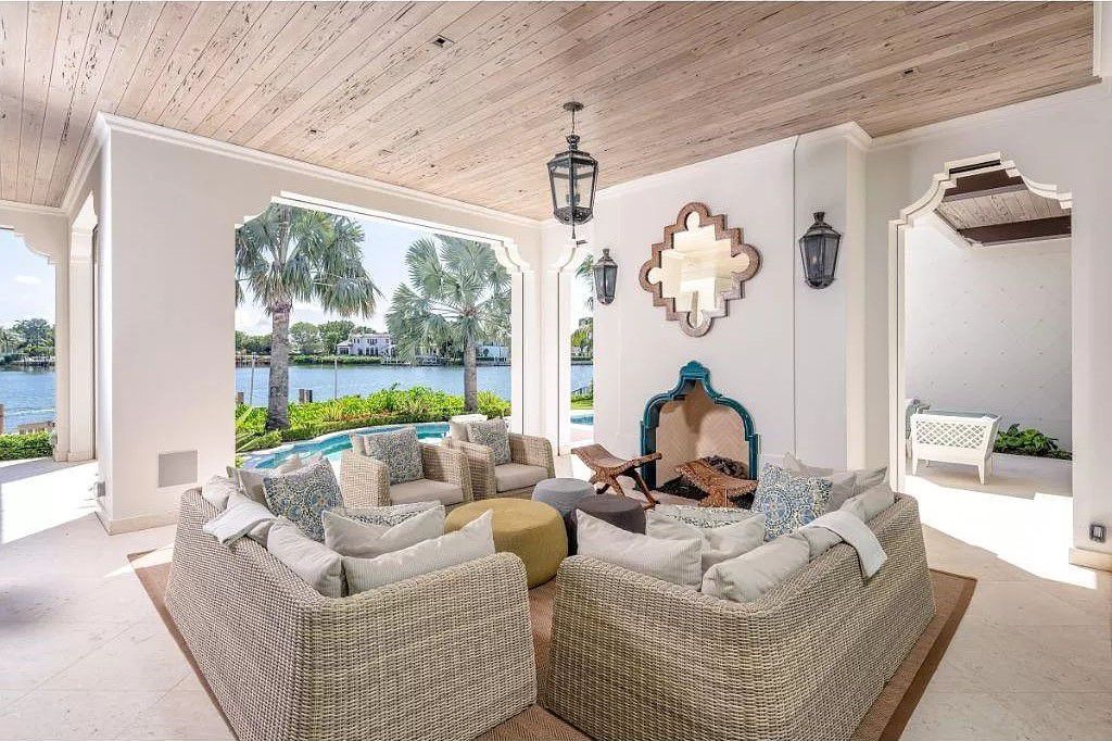 Indulge in the pinnacle of waterfront luxury at 3401 Rum Row, Naples, Florida. This exquisite property, with approximately 130 feet of shoreline, offers unparalleled vistas of Galleon Cove. Crafted by London Bay Construction, Inc. and designed by Stofft Cooney Architects, LLC, it harmonizes opulent interiors by Anthony Catalfano Interiors with lavish outdoor entertainment spaces.