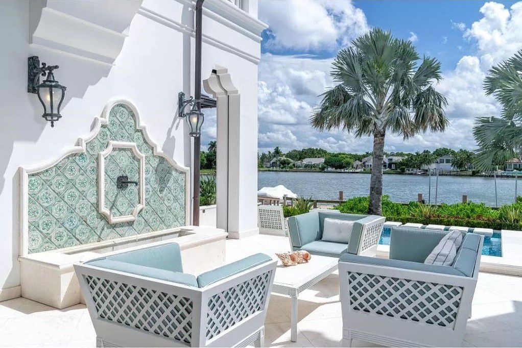 Indulge in the pinnacle of waterfront luxury at 3401 Rum Row, Naples, Florida. This exquisite property, with approximately 130 feet of shoreline, offers unparalleled vistas of Galleon Cove. Crafted by London Bay Construction, Inc. and designed by Stofft Cooney Architects, LLC, it harmonizes opulent interiors by Anthony Catalfano Interiors with lavish outdoor entertainment spaces.