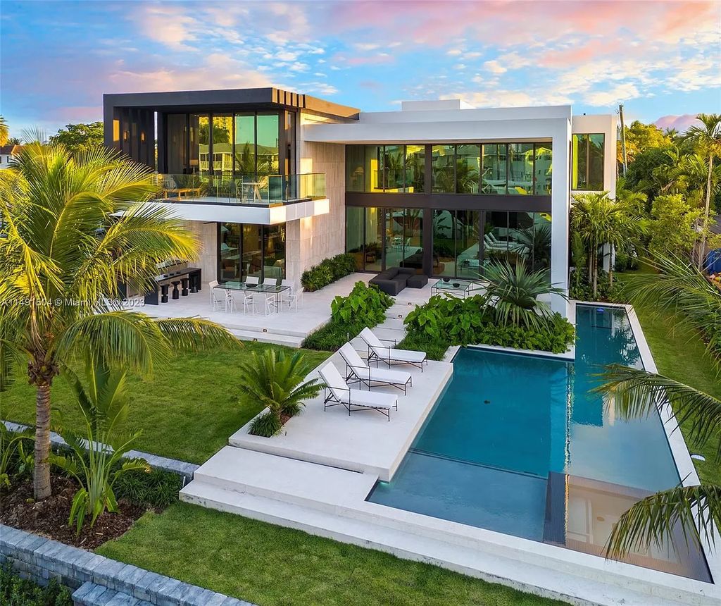 Immerse yourself in the pinnacle of luxury waterfront living at this newly built 2024 estate in Golden Isles. Boasting sleek architecture and an enviable position on a wide canal, this two-story, 7-bedroom, 9-bathroom residence embodies sophistication.