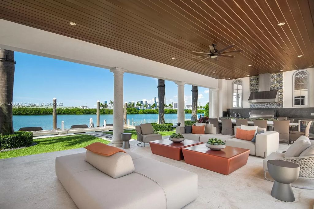 Discover an unrivaled luxury compound on Palm Island, Miami Beach, spanning 2 acres with 300 feet of waterfront. This extraordinary estate comprises three exquisite homes showcasing impeccable craftsmanship and the finest materials.