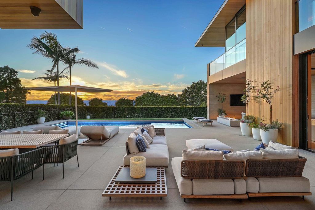 1001 1st Street Home in Manhattan Beach, California. Explore the epitome of luxurious beach living with this meticulously crafted 6-bed, 9-bath Contemporary estate in Manhattan Beach. From the undulating wave-like concrete walls to the warm cedar interiors, every detail exudes sophistication. 