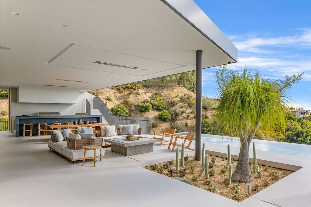 1680 N Doheny Drive Home in Los Angeles, California. Step into luxury with this just-completed 13,500 SF contemporary masterpiece in the exclusive Bird Streets above the Sunset Strip. Designed by Vantage Design Group, this concrete and steel construction home offers panoramic views and high fire resistance.